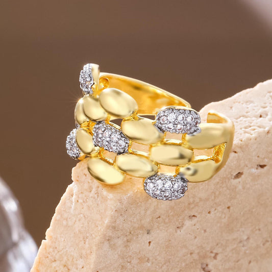 Close-up of Sparkling Zircon Clusters on a Modern Gold Statement Band