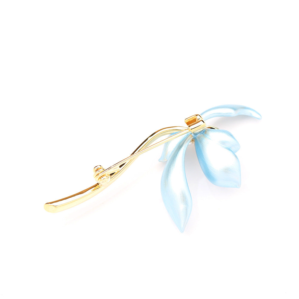 Artistic blue iris brooch with hand-painted enamel petals and a lustrous white pearl center