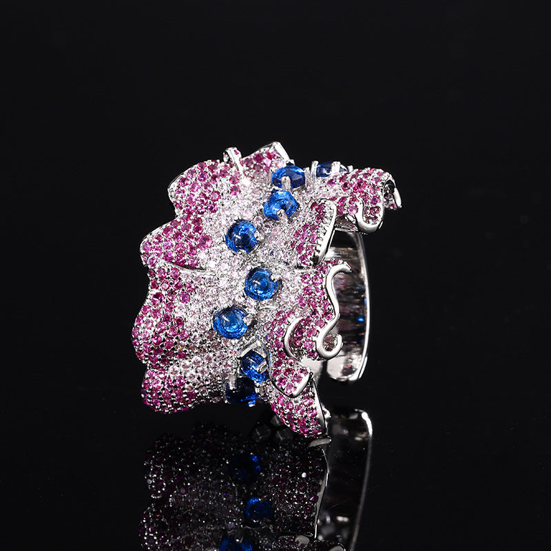 Bold Silver Irregular Ripple Statement Ring with Shimmering Zircon Pavé in a Modern Abstract Design