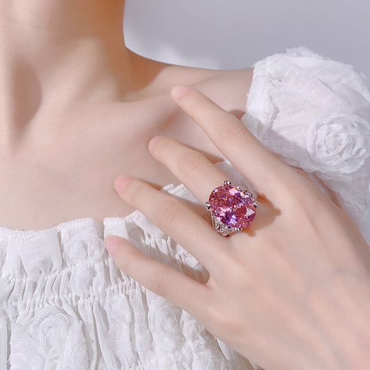 Romantic silver Open Ring featuring a Vibrant Pink Cubic Zirconia Stone and Sparkling Twisted Rope Band Design
