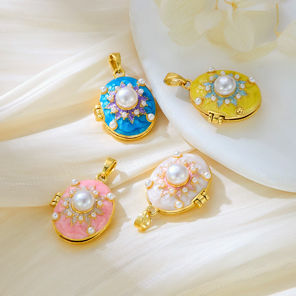 Wholesale stainless steel jewelry oval photo locket with colorful enamel, sunburst halo, and center pearl accent.