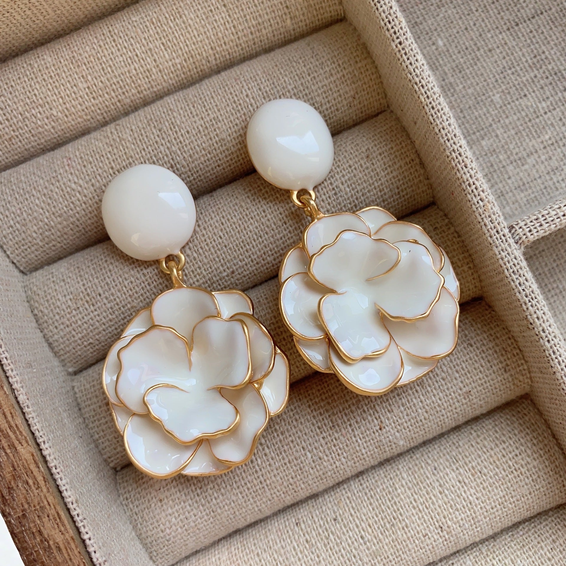 Creamy white gardenia flower stud earrings with 18K gold plating and delicate enamel petals
