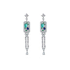 Elegant long tassel drop earrings with 18K white gold plating. Sleek vertical silver-tone linear design