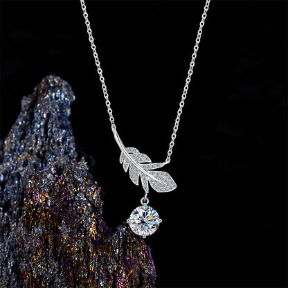 Elegant S925 sterling silver necklace featuring a delicate feather pendant with a brilliant 1ct moissanite stone and GRA certification