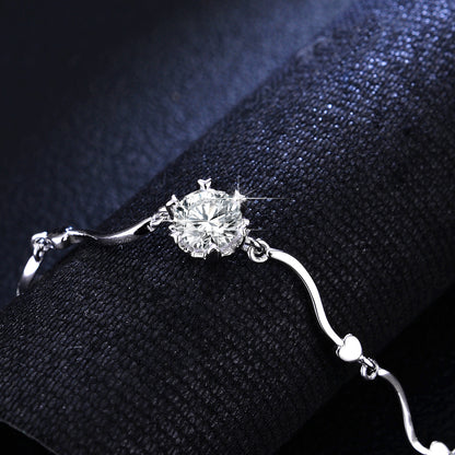 Classic silver bracelet featuring a brilliant 1ct moissanite stone in a secure six-prong solitaire setting