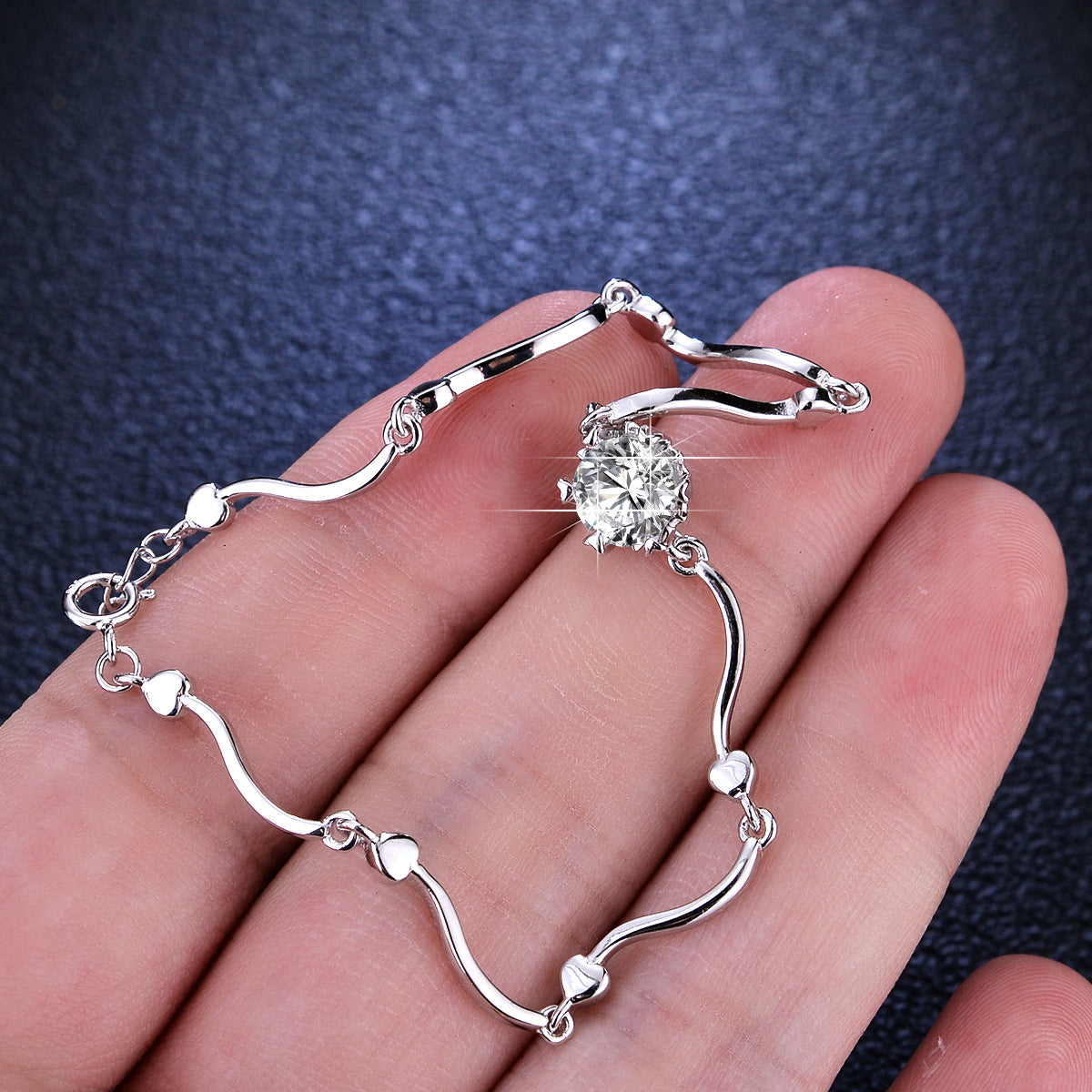 Classic silver bracelet featuring a brilliant 1ct moissanite stone in a secure six-prong solitaire setting