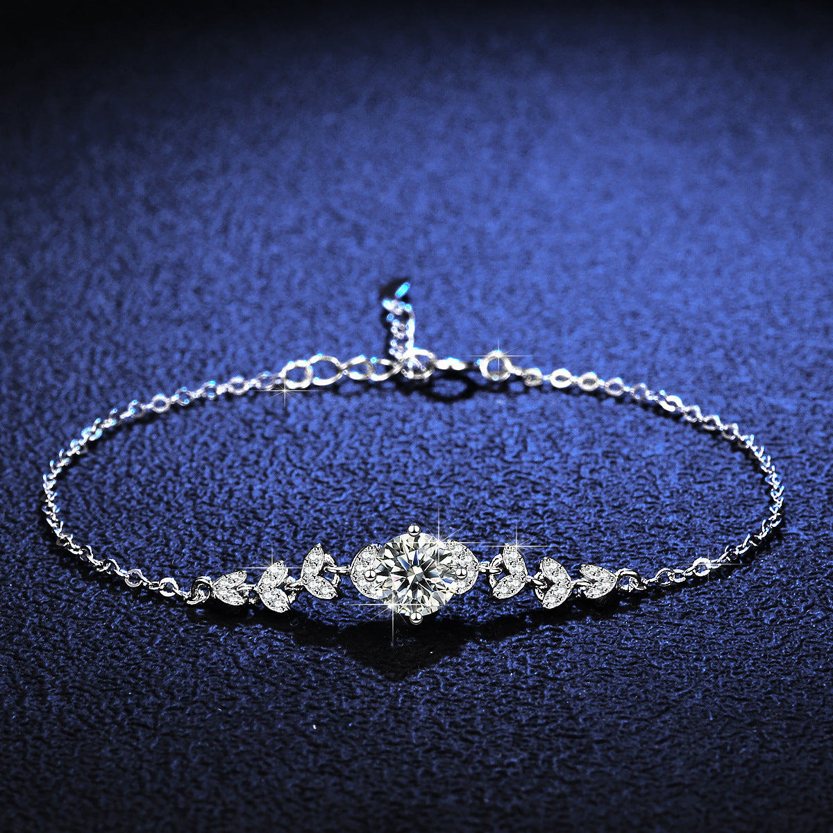 Minimalist silver bracelet featuring a brilliant 1ct moissanite solitaire stone in a sparkling claw setting