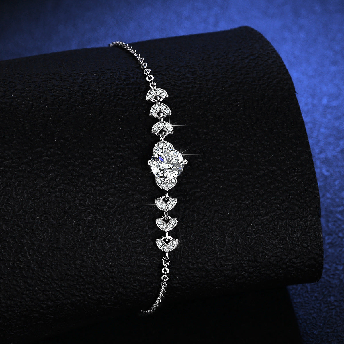 Minimalist silver bracelet featuring a brilliant 1ct moissanite solitaire stone in a sparkling claw setting