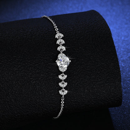 Minimalist silver bracelet featuring a brilliant 1ct moissanite solitaire stone in a sparkling claw setting