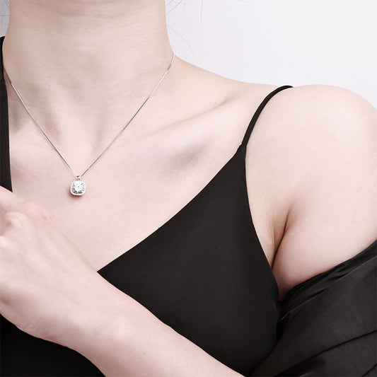 Elegant S925 sterling silver necklace featuring a 1ct round moissanite centerpiece surrounded by a sparkling square halo of accent stones