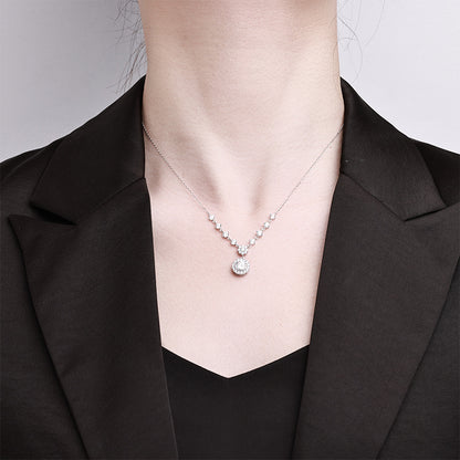 Sparkling S925 sterling silver necklace featuring a 1ct round moissanite centerpiece with a brilliant halo of accent stones