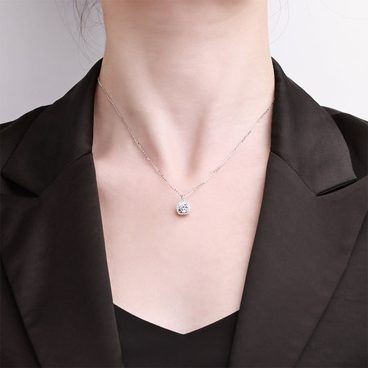 Dainty S925 sterling silver necklace featuring a 1ct round moissanite pendant with a brilliant halo setting and GRA certification