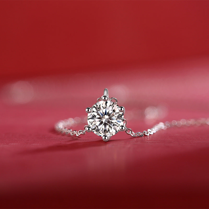 Classic S925 sterling silver solitaire necklace featuring a 1ct round moissanite in a secure six-prong setting with GRA certification