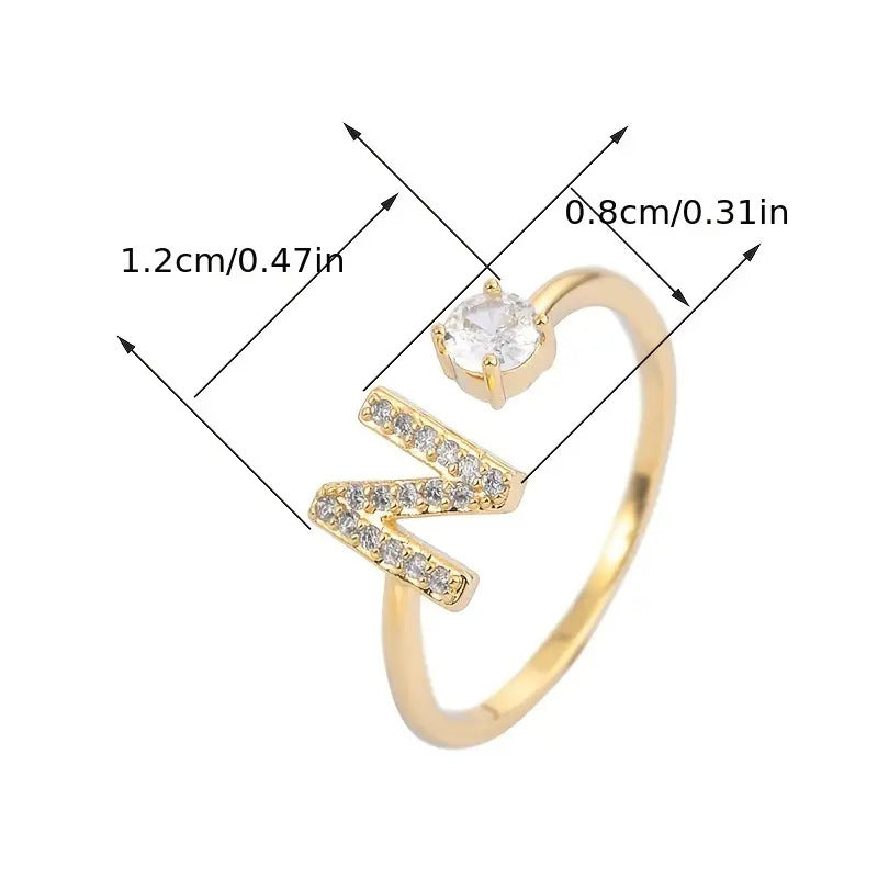 Pave cubic zirconia micro cz crystal 26 A to Z letters initial open cuff adjustable ring stainless steel jewelry in waterproof 18k gold plated finish.