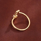 Pave cubic zirconia micro cz crystal 26 A to Z letters initial open cuff adjustable ring stainless steel jewelry in waterproof 18k gold plated finish.