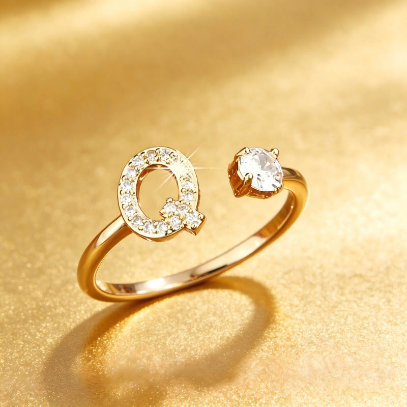 Pave cubic zirconia micro cz crystal 26 A to Z letters initial open cuff adjustable ring stainless steel jewelry in waterproof 18k gold plated finish.