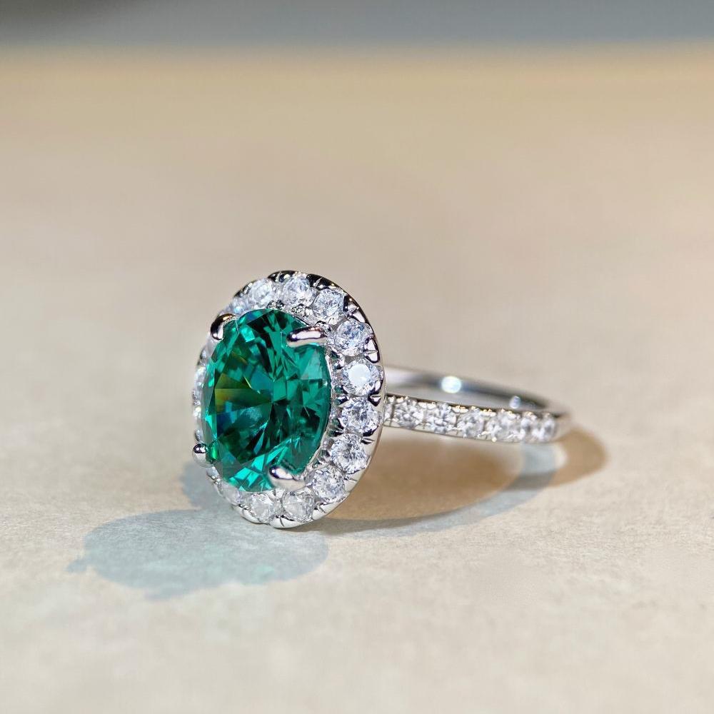 4 carat oval Paraiba-style green gemstone ring with a sparkling zircon halo, set in S925 sterling silver