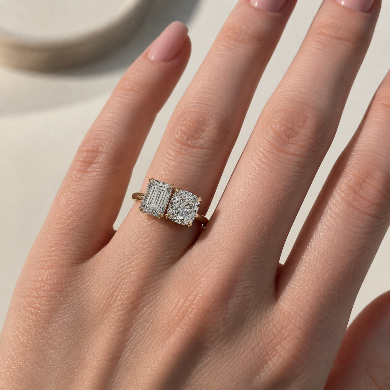 4 carat Toi et Moi moissanite ring featuring emerald and cushion cut stones in an adjustable 18K gold plated S925 silver band