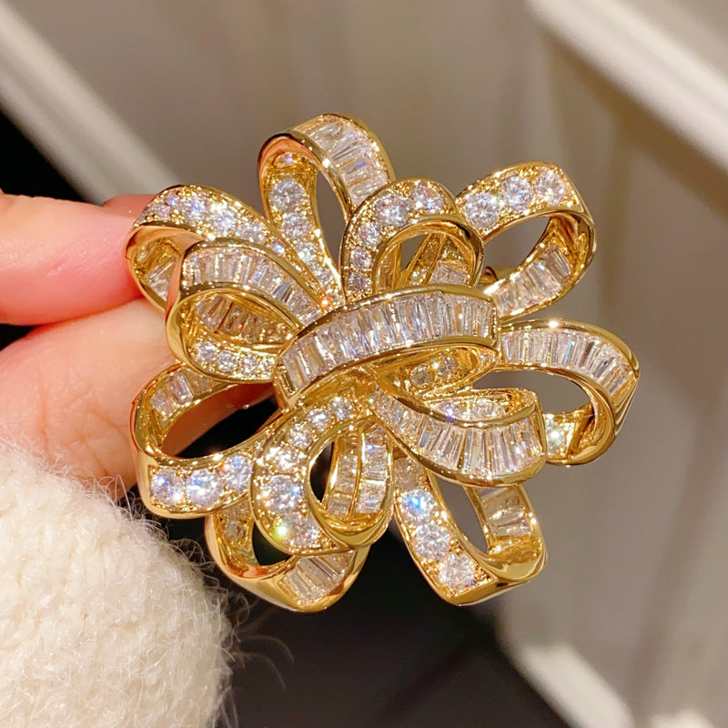 Elegant Golden Bow Brooch