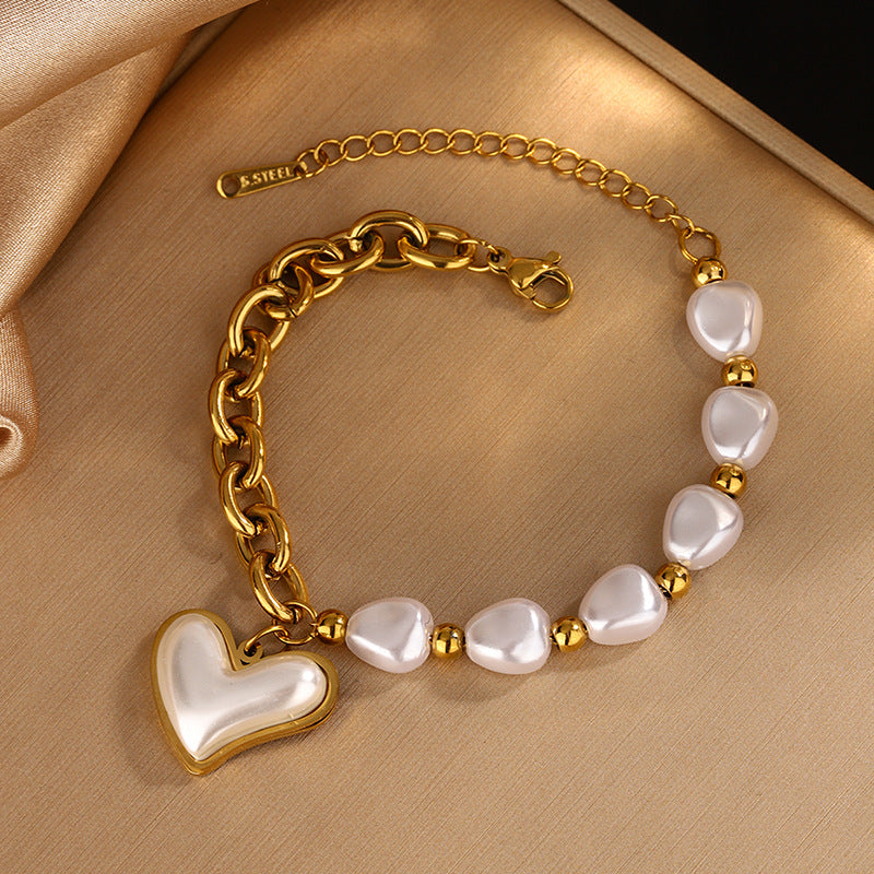 Baroque pearl bead chain and heart pearl pendant stainless steel jewelry bracelet in waterproof 18k gold plated finish.