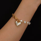 Baroque pearl bead chain and heart pearl pendant stainless steel jewelry bracelet in waterproof 18k gold plated finish.