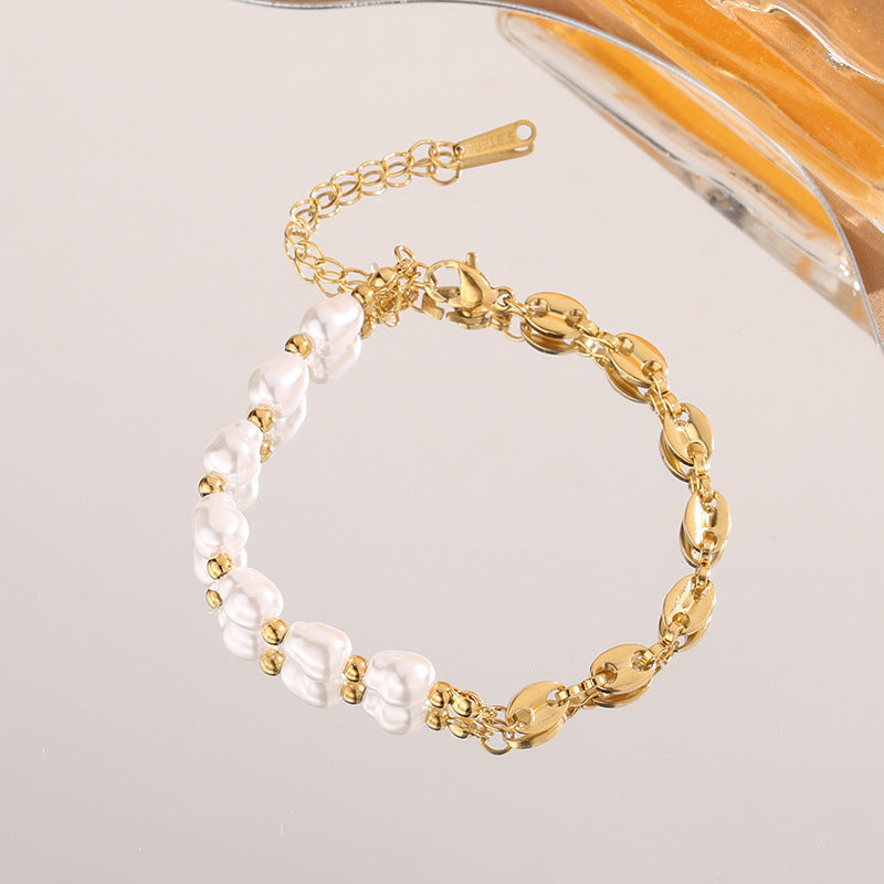 Baroque pearl bead strand and mariner puff bean chain stainless steel jewelry bracelet in waterproof 18k gold plated finish.