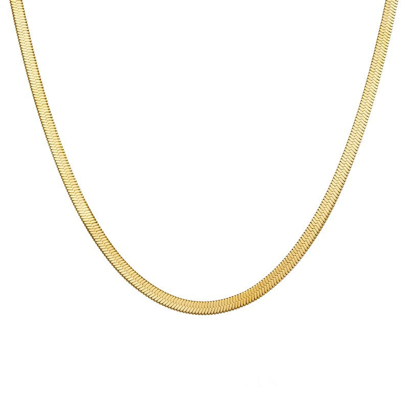 Natural baroque pearl pendant cable chain and flat herringbone chain layered necklace in gold plated titanium steel jewelry.