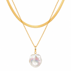 Natural baroque pearl pendant cable chain and flat herringbone chain layered necklace in gold plated titanium steel jewelry.