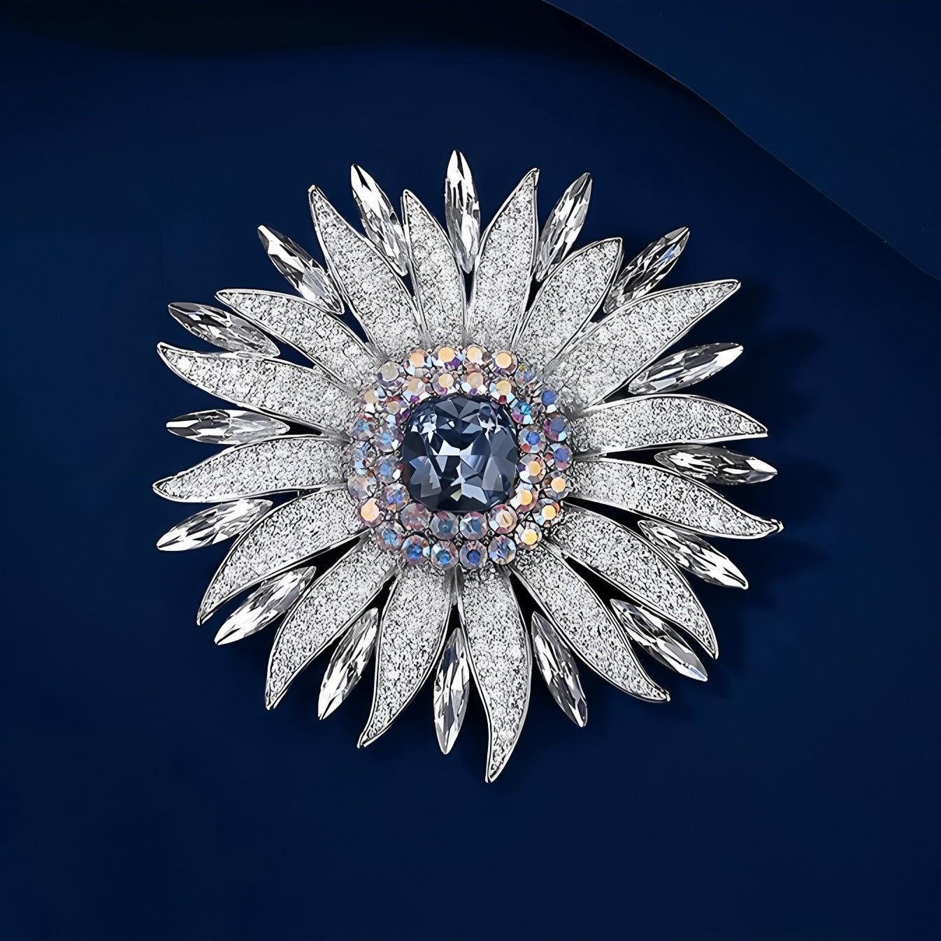 Elegant wheat ear brooch featuring light blue and white cubic zirconia stones in an 18K white gold plated setting