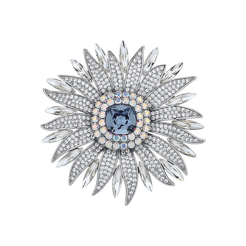 Elegant wheat ear brooch featuring light blue and white cubic zirconia stones in an 18K white gold plated setting