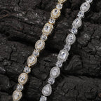 Elegant bypass wrap bracelet with sparkling zirconia halo charms, available in gold, silver, and rose gold