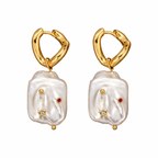 Natural Stainless steel jewelry baroque pearl huggie drop earrings inlaid with gold starburst cz crystal and ruby red stone accents.