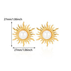 Paired vintage-style gold sunburst stud earrings featuring a central lustrous white pearl