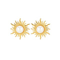 Paired vintage-style gold sunburst stud earrings featuring a central lustrous white pearl