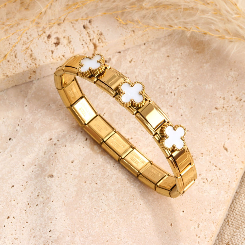 Four-leaf clover inlay stretch expansion link bracelet in waterproof 18k gold plated stainless steel jewelry.