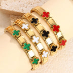 Four-leaf clover inlay stretch expansion link bracelet in waterproof 18k gold plated stainless steel jewelry.
