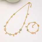 Colorful  Stainless steel jewelry enamel double-sided dopamine bracelet with pastel flower and heart charms on a gold paperclip chain.