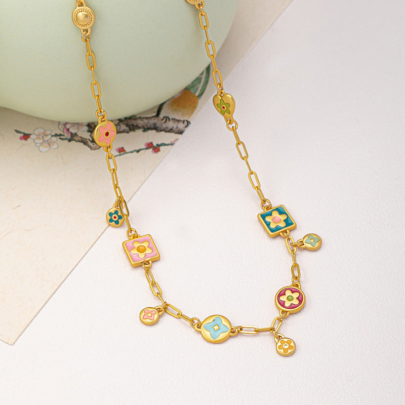 Colorful  Stainless steel jewelry enamel double-sided dopamine necklace with pastel flowers and starburst stations on paperclip chain.