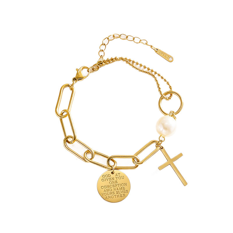 Cross charm pearl bead and engraved quote disc paperclip chain stainless steel jewelry bracelet in waterproof 18k gold plated finish.