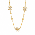 Cubic zirconia cz crystal flower stations and gold bead accents link chain bracelet stainless steel jewelry in waterproof 18k gold plated finish.