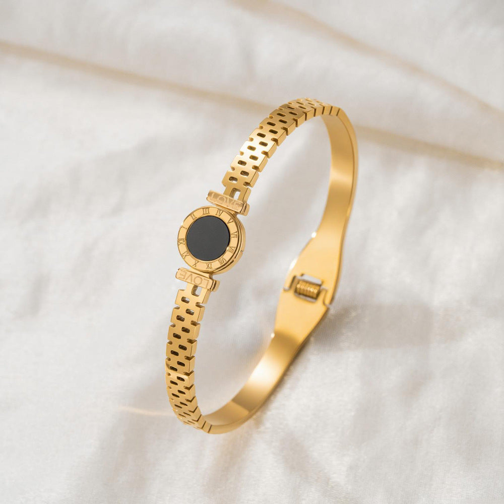 Round disc shell inlay and watch-band link mesh style stainless steel jewelry bangle in waterproof 18k gold plated finish.