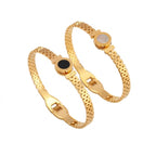 Round disc shell inlay and watch-band link mesh style stainless steel jewelry bangle in waterproof 18k gold plated finish.
