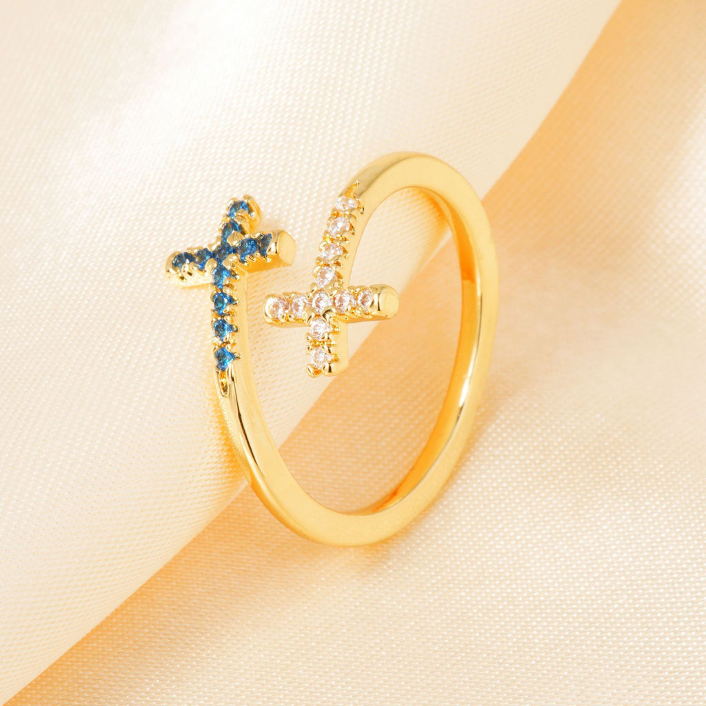 Micro pave cubic zirconia cz crystal double cross bypass open cuff adjustable ring stainless steel jewelry in waterproof 18k gold plated finish.