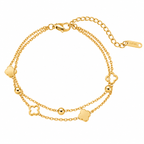 Double strand chain shell clover station and bead accent stainless steel jewelry bracelet in waterproof 18k gold plated finish.