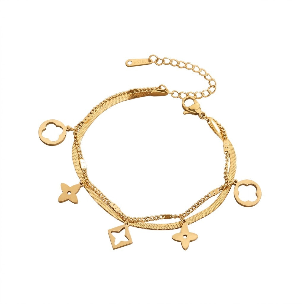Double layer flat snake chain and cable link with clover motifs and geometric charms stainless steel jewelry bracelet in waterproof 18k gold plated finish.