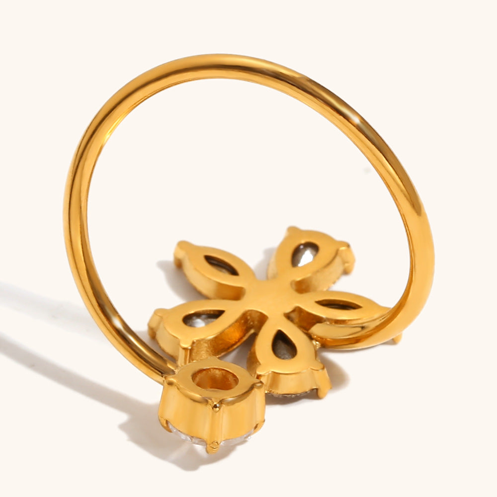 Marquise cubic zirconia cz crystal five petal flower and solitaire round stone open cuff adjustable ring stainless steel jewelry in waterproof 18k gold plated finish.