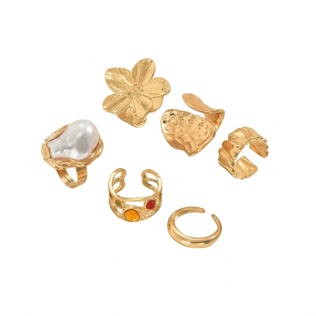 Textured open cuff flower motif, baroque pearl accent, and hammered gold bands 6 piece adjustable stackable ring set stainless steel jewelry in waterproof 18k gold plated finish.