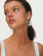 Fluid ribbon bow pendant Singapore twist chain necklace with sparkling crystal accents in 18k gold plated jewelry.