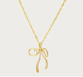 Fluid ribbon bow pendant Singapore twist chain necklace with sparkling crystal accents in 18k gold plated jewelry.