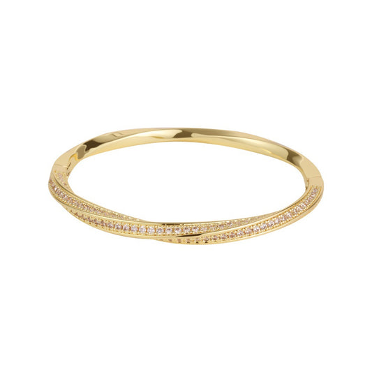 Modern gold bypass wrap bangle featuring dual round halo charms with sparkling white cubic zirconia